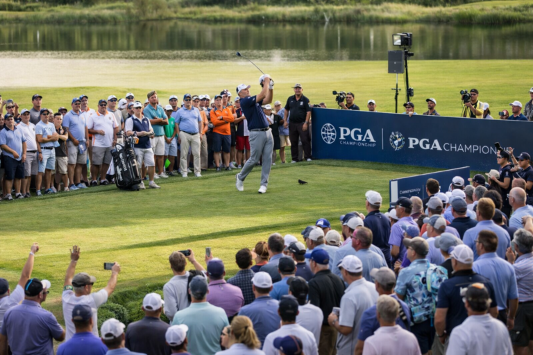 AI-generated image of a professional golfer hitting an approach shot during a PGA Championship style tournament with a large gallery of spectators watching beside the fairway.